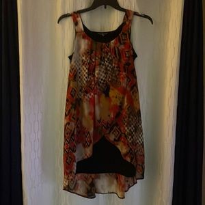 Cute orange and black shirt/ dress.